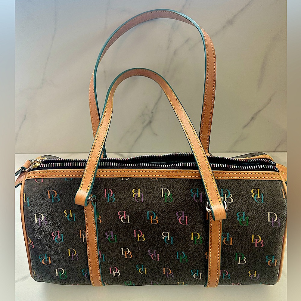 Dooney and Bourke purse. Never used, no damage, perfect condition.